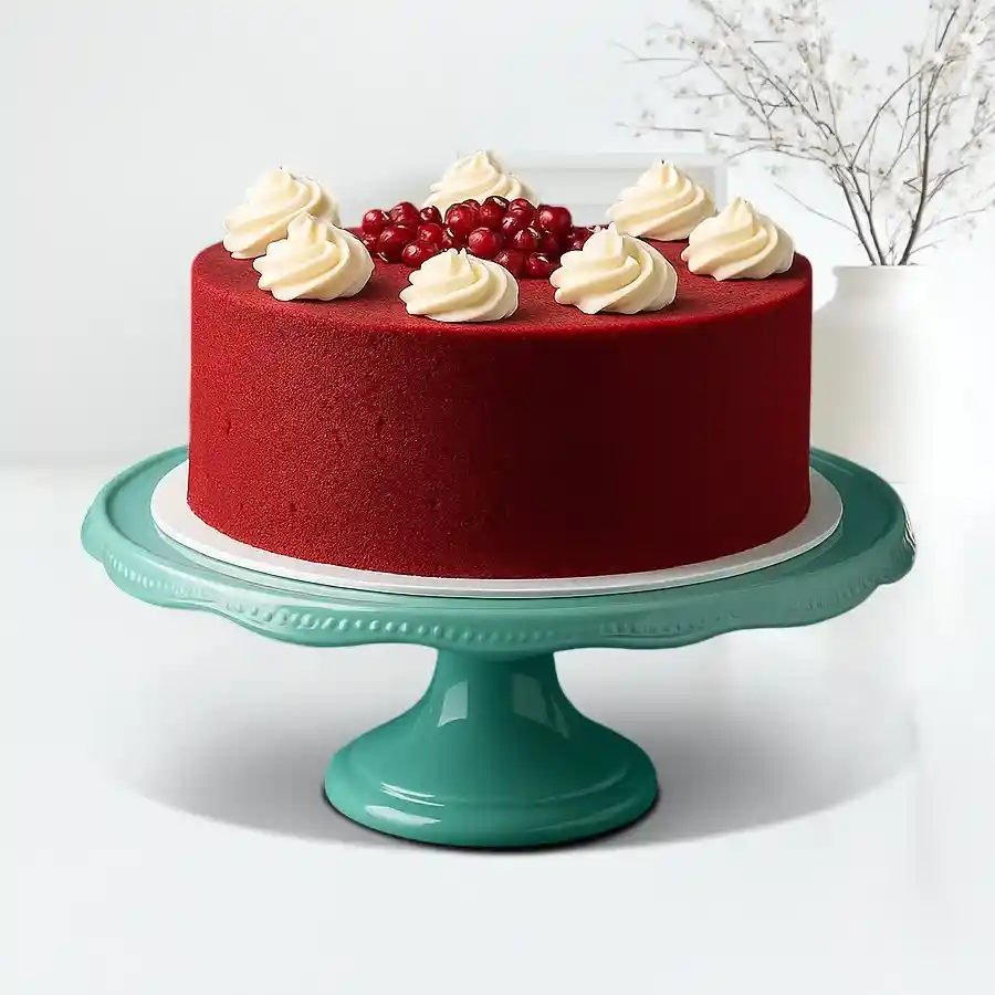 A stunning 1 lb Red Velvet Cake from Theobroma, showcasing rich layers and cream cheese frosting, perfect for celebrations and indulgence.