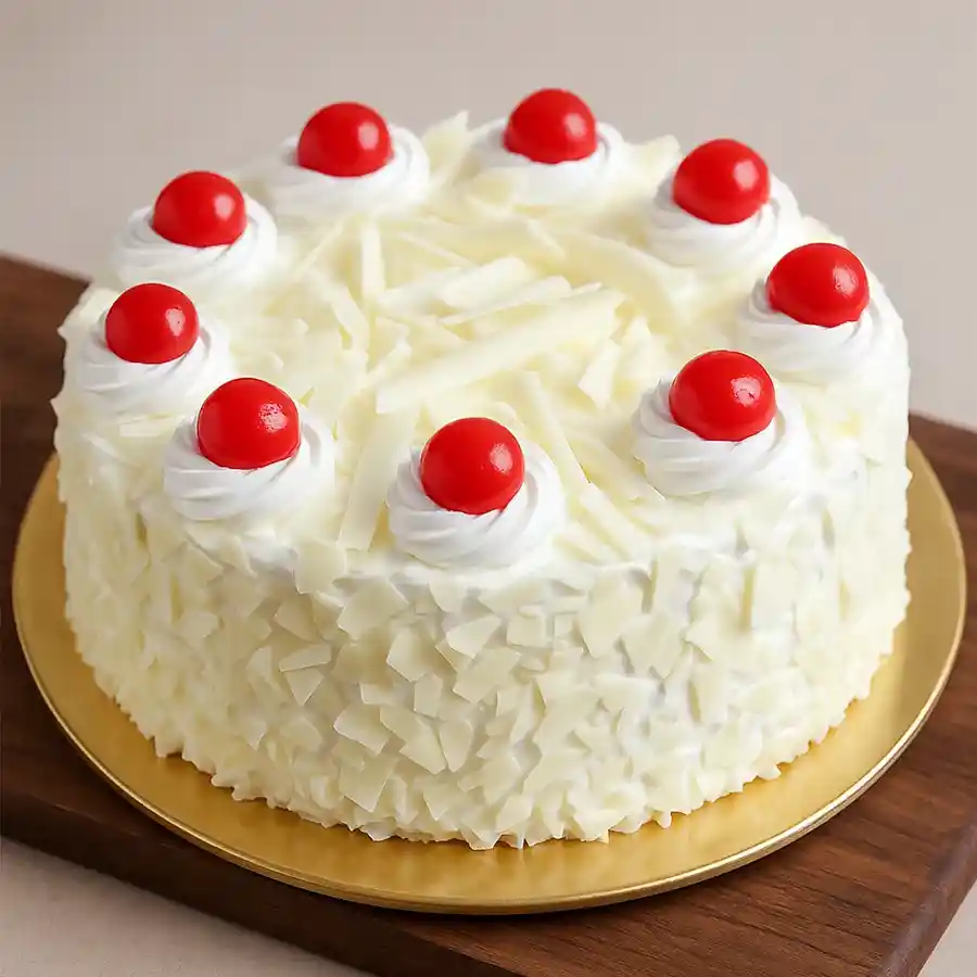 A beautifully decorated 1/2 kg White Forest Cake, perfect for celebrations and sending love.