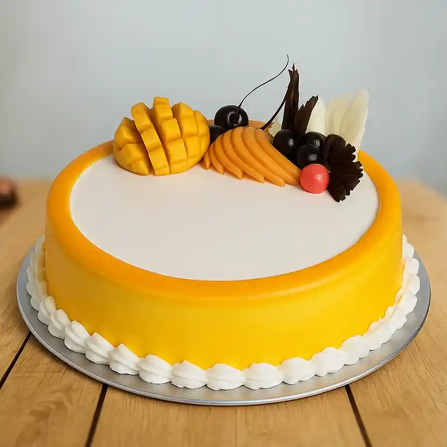 A delightful 1/2 kg vanilla fruit cake adorned with vibrant fruit pieces, perfect for sharing love and joy.