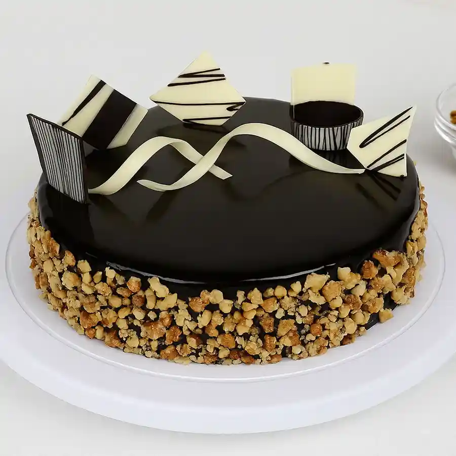 A 1/2 kg Choco Walnut Delight Cake, showcasing rich chocolate and crunchy walnuts, ideal for gifting.