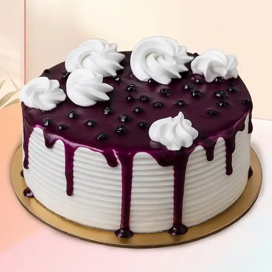 A beautifully crafted 1/2 kg Premium Blueberry Cake, designed for joyous occasions and sharing with loved ones.