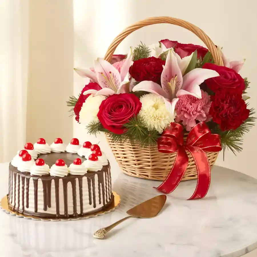 A festive combo featuring a 1LB Black Forest cake and a colorful flower basket, ideal for Christmas celebrations.