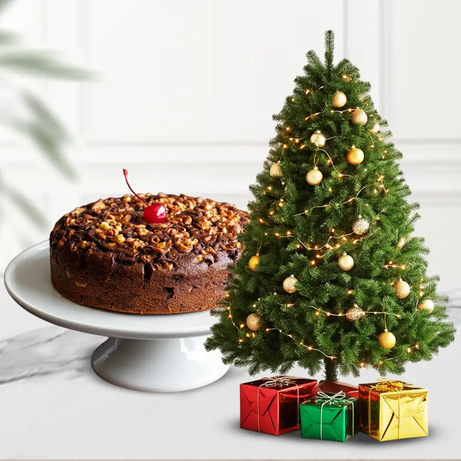 Delightful Dry Plum Cake with Christmas tree and decorations.