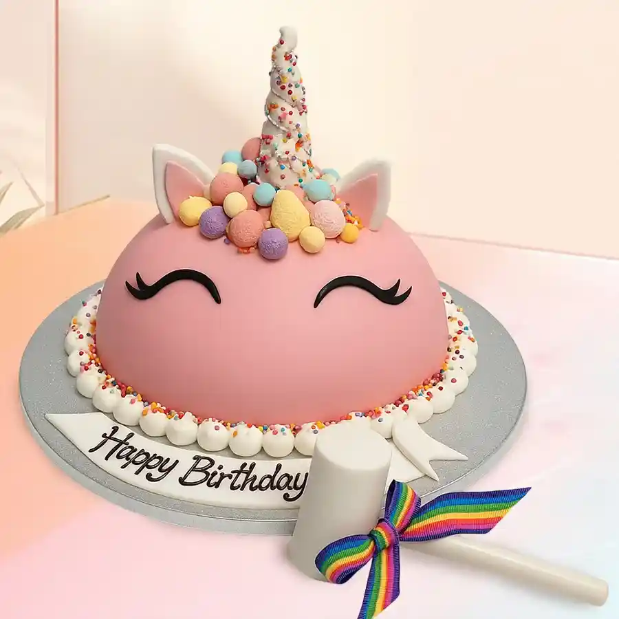A vibrant Designer Unicorn Smash Cake with a hammer, perfect for celebrations, weighing 2.2 lbs.
