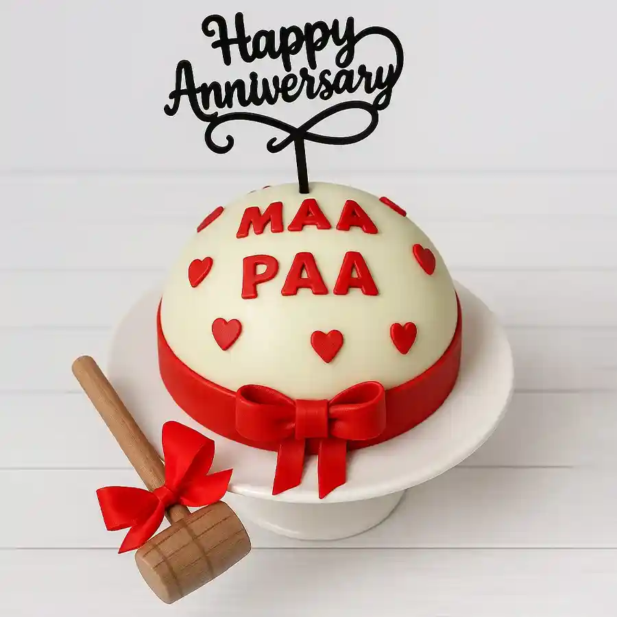 Scrumptious Round White Pinata Cake with hammer for anniversaries.