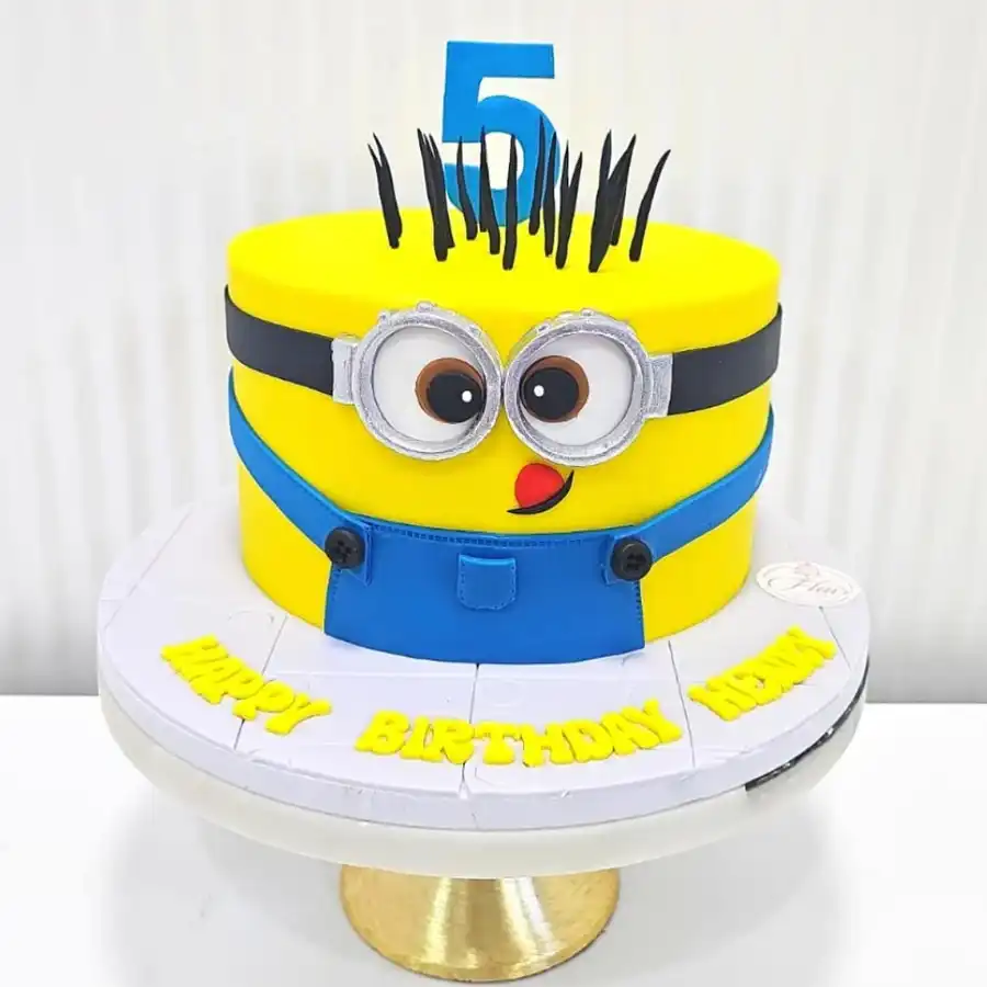 Two tier Minion-themed cake for kids, weighing 5 kg, perfect for celebrations.