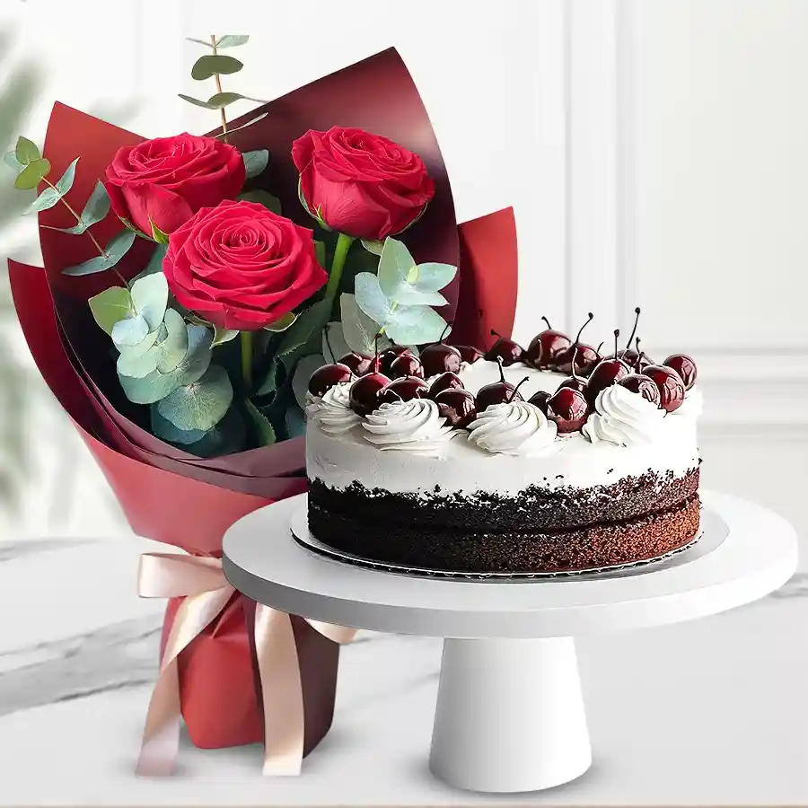 A beautiful bouquet of 3 red roses alongside a 500g Black Forest cake, ideal for gifting on special occasions.