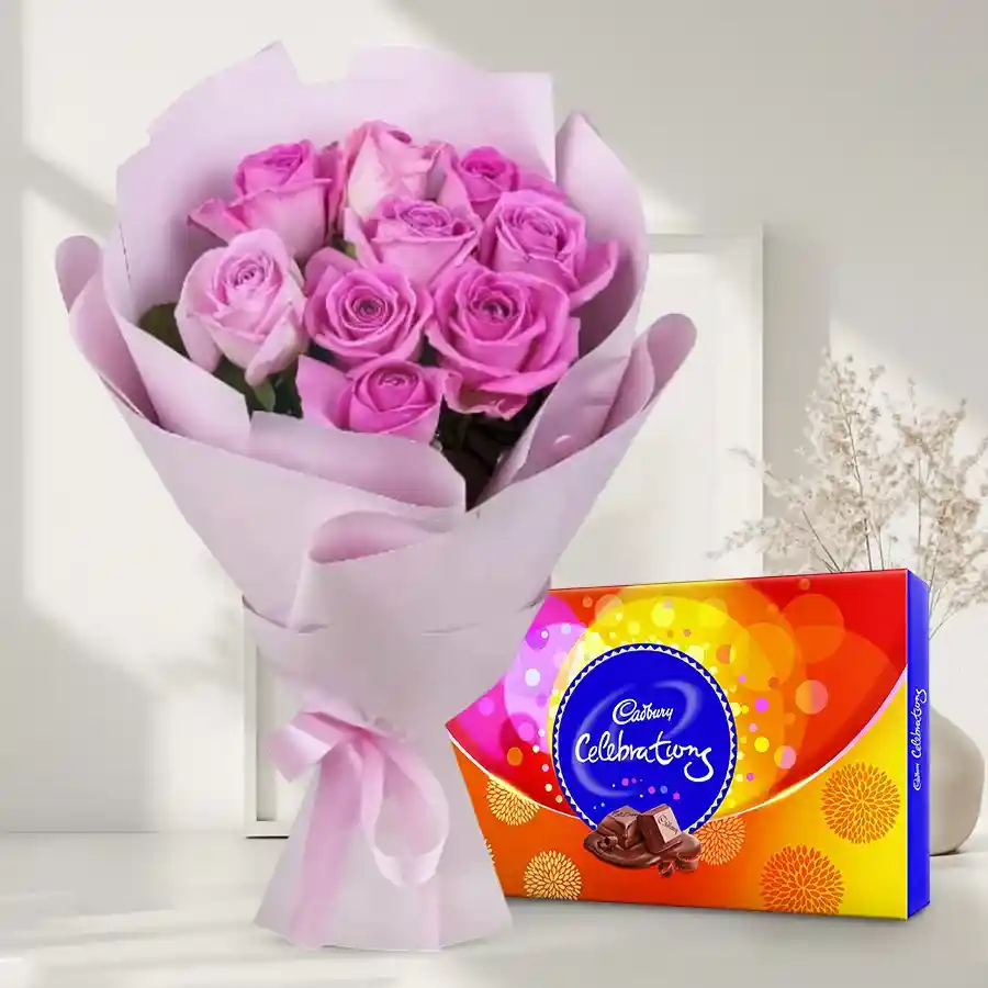 A delightfully arranged bouquet of 9 pink roses with a Cadbury Celebrations pack.