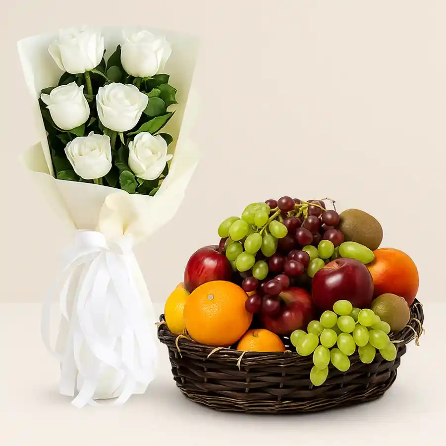 A compassionate gift set featuring a bouquet of white roses and a selection of fresh fruits for expressing condolences.