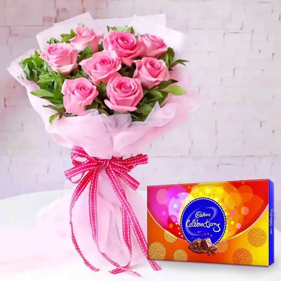 8 pink roses paired with a box of Cadbury Celebrations chocolates.