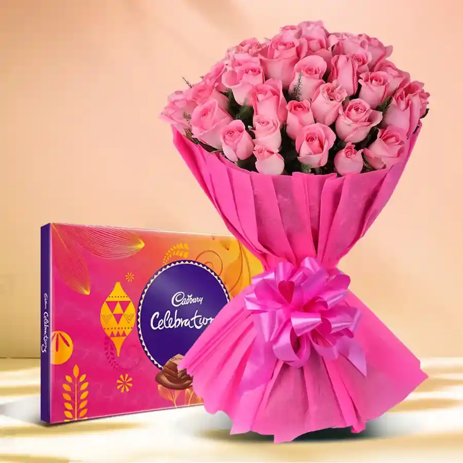Joyful Rose and Chocolate Duo featuring 10 pink roses and Cadbury Celebrations pack. Perfect gift for anniversaries and special occasions.