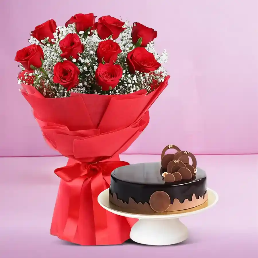 A vibrant bouquet of ten red roses alongside a decadent one-pound chocolate cake, perfect for celebrating special occasions like anniversaries.