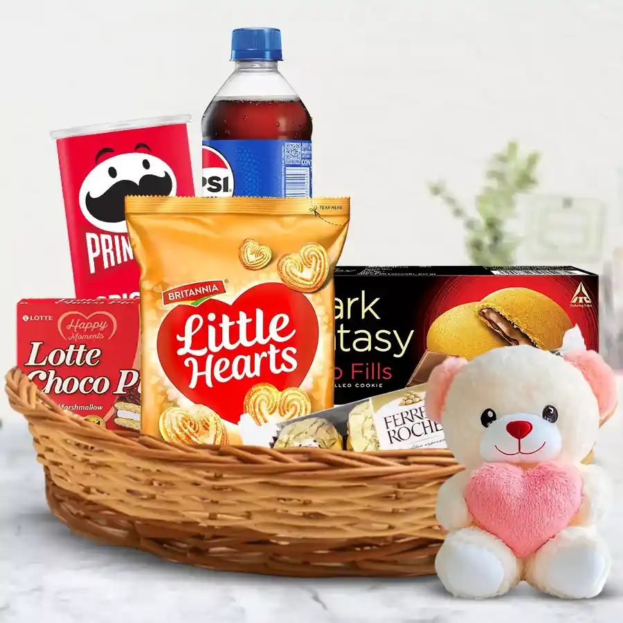 Gourmet Treats Gift Basket filled with snacks, chocolates, and a teddy bear for special occasions.