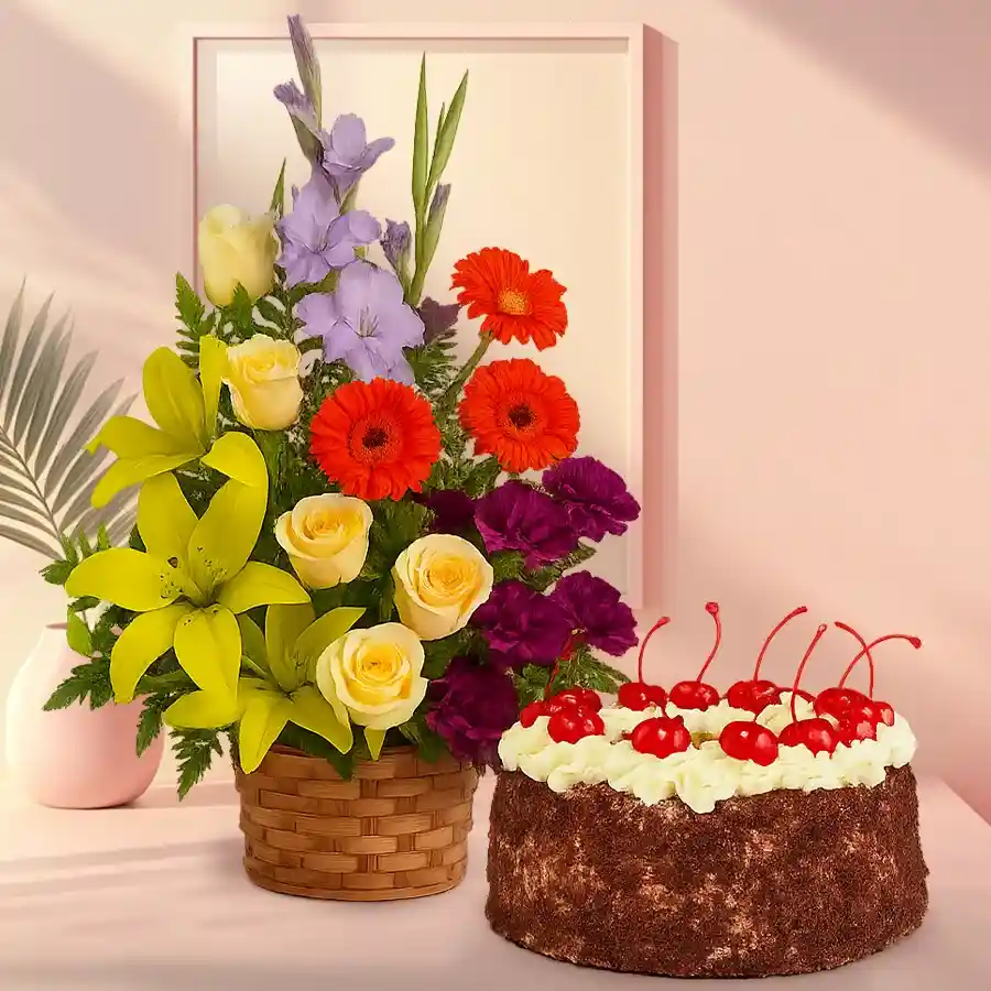 Seasonal flower arrangement with Black Forest cake for celebrations.