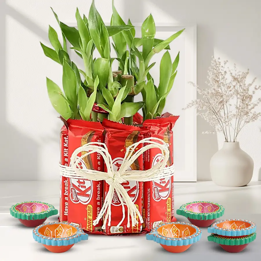 Mud Diya with 2 Tier Lucky Bamboo and KitKat arrangement.