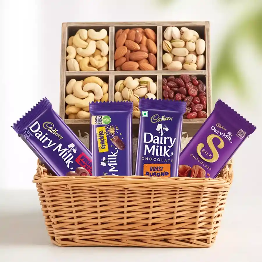 A charming basket filled with crunchy dry fruits and assorted Cadbury chocolates for Mother's Day celebration.