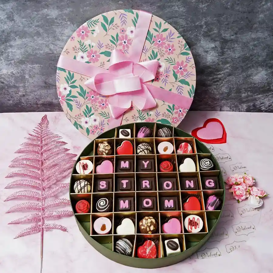 Tasteful Assorted 37 Chocolates Gift Box for Mom with an elegant round design and chocolates featuring various flavors and a message "My Strong Mom"