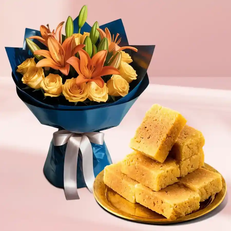Beautiful bouquet of orange lilies and yellow roses with Mysore Pak.