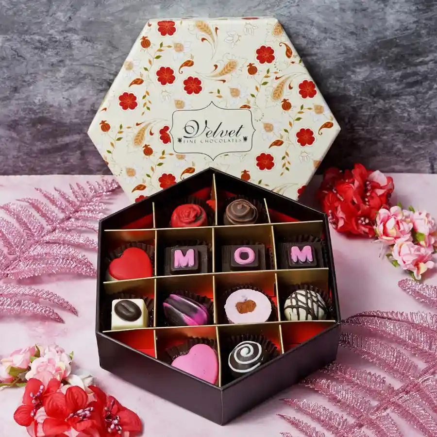 Delightful Mom Assorted Chocolate Box featuring 12 varied chocolates including Milk Truffle, Dark Truffle, Rose, Coffee, Strawberry, Pista, and Oreo Truffle in an elegant packaging