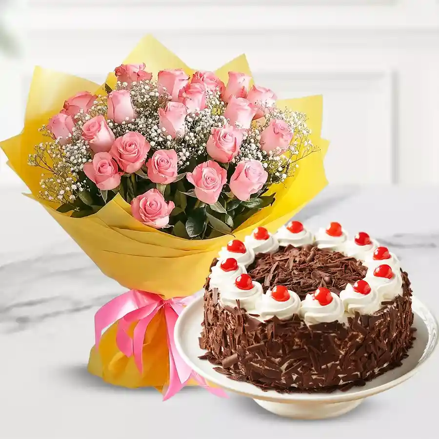A stunning bunch of pink roses with gypsophilia paired with a delicious Black Forest cake, perfect for gifting on special occasions.