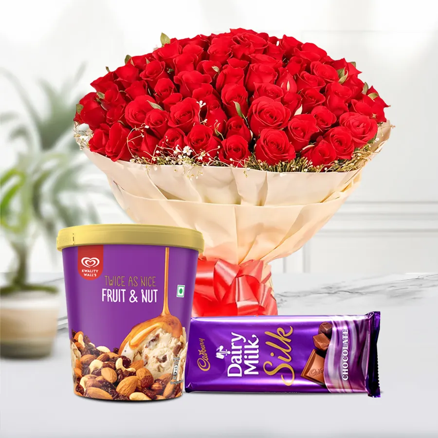Romantic red roses bouquet with ice cream and chocolate treats.