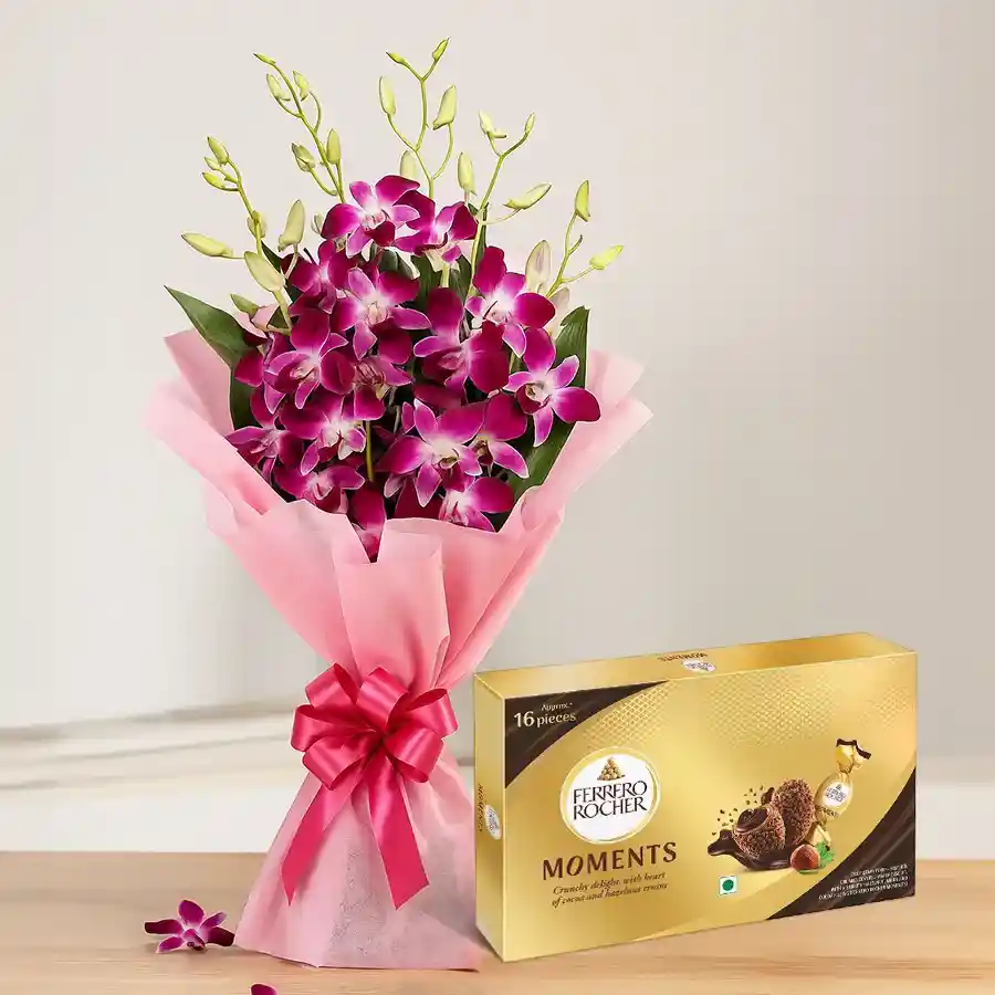 Beautiful bouquet of 6 orchids with a box of Ferrero Rocher chocolates.