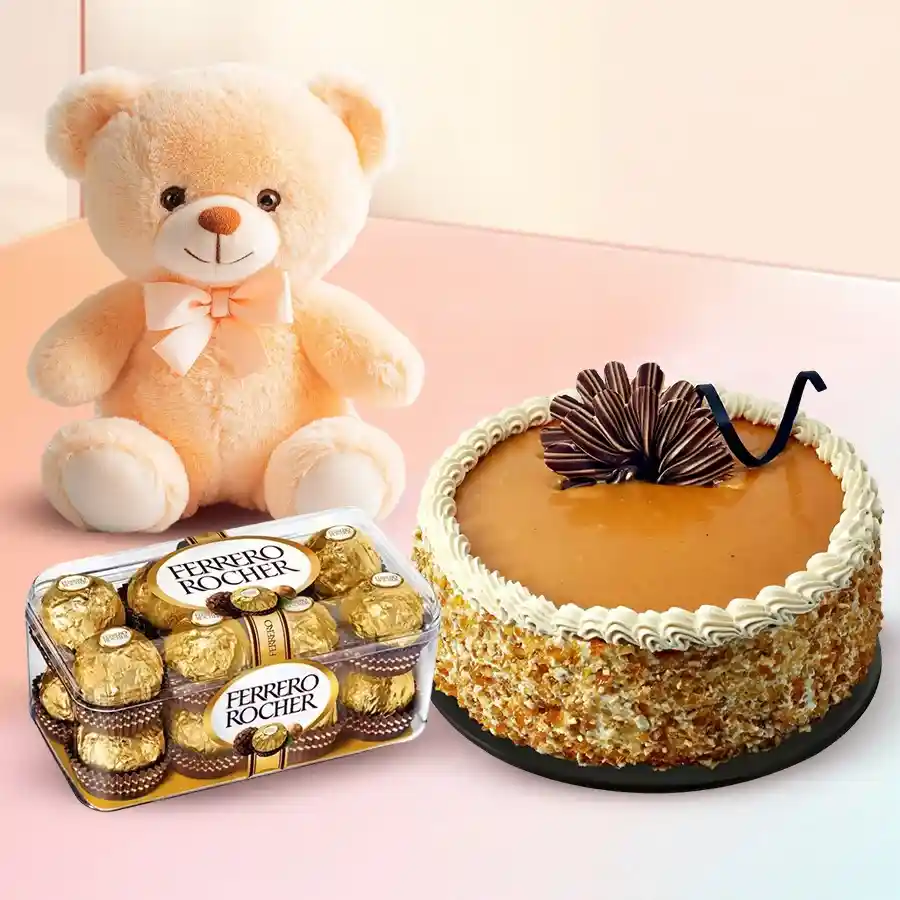 A delightful gift set featuring a butterscotch cake, Ferrero Rocher chocolates, and a cute teddy bear for special occasions.