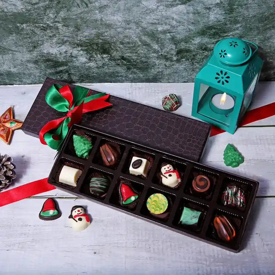 Blissful Assorted Xmas Chocolates Box featuring 12 festive chocolates in a stylish brown gift box