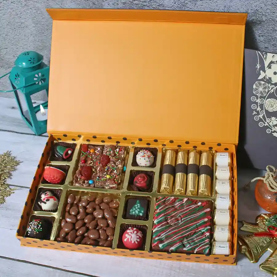 Assorted premium chocolates in a beautifully designed gift box with seasonal themes
