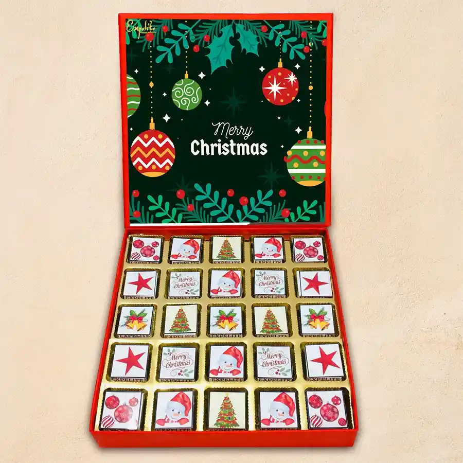 A beautifully arranged box of Christmas Special Chocolaty Confections featuring assorted chocolates with festive designs.