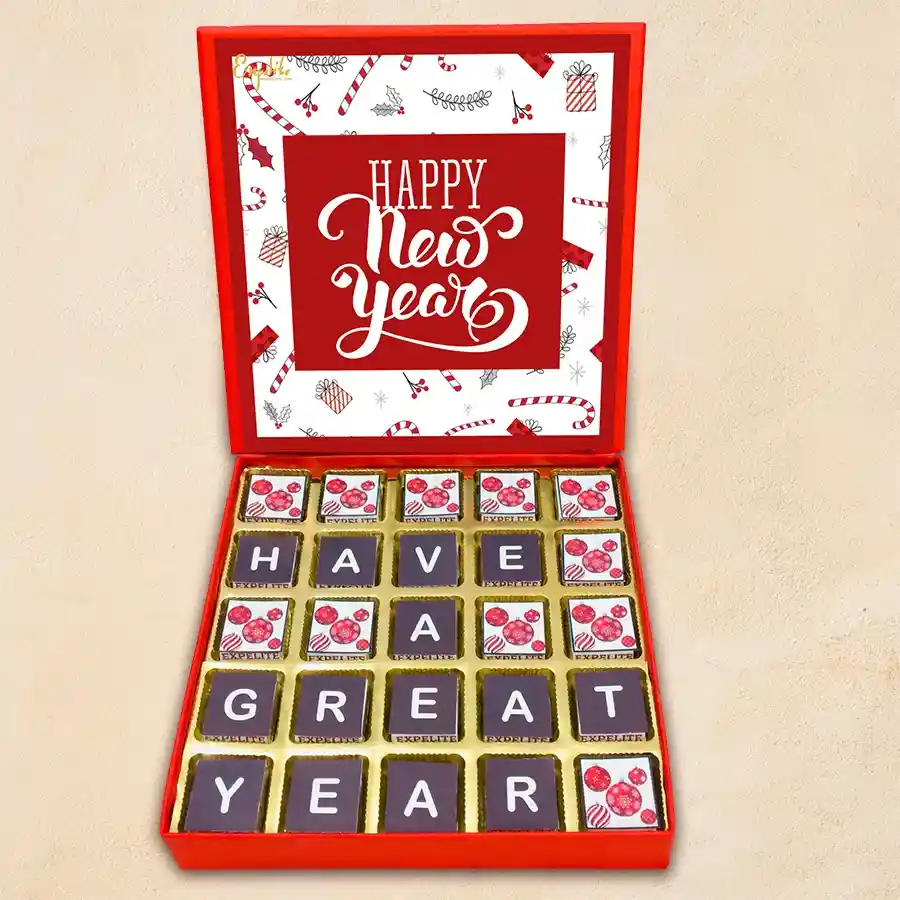 Assorted box of 25 chocolates featuring various flavors in a festive New Year-themed packaging.