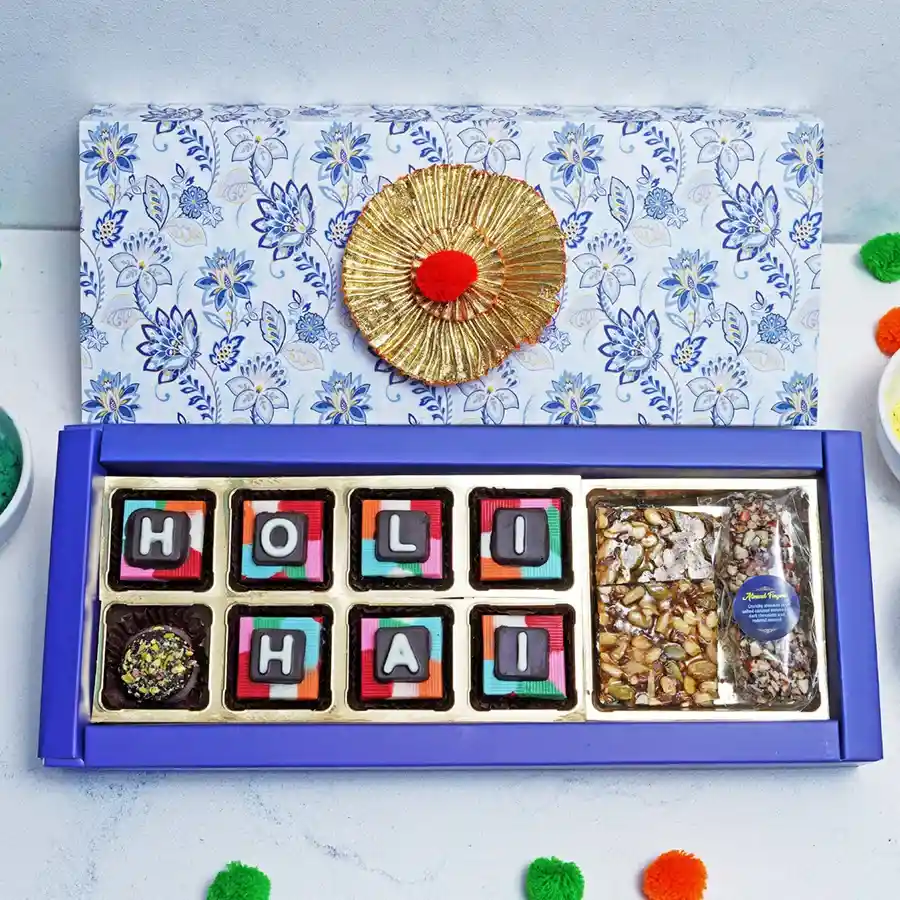 Assorted Chocolates Elegance Box featuring a variety of chocolates, seeds squares, pistachio truffle, and almond finger in an elegant packaging