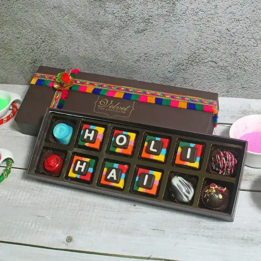 Sumptuous Chocolate Indulgence Box containing 12 handcrafted assorted chocolates in a variety of flavors and textures.