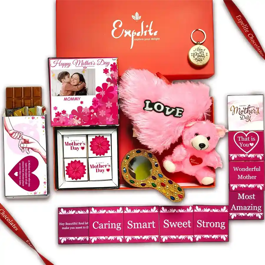 Personalized Mother's Day gift bundle including chocolates, keyring, heart-shaped pillow, teddy bear, hand mirror, chocolate bar, and greeting cards.