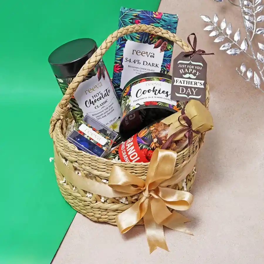 Exquisite Chocolates N Assortments Hamper featuring Tin Hot Chocolate, Blueberry Dragees, Oats Raisins Cookies, Almond Cranberry Granola, and Dark Belgian Chocolate with Roasted Almond.