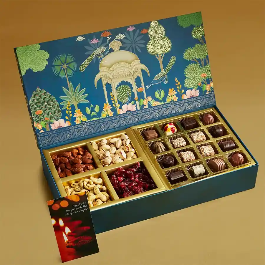 Gourmet Diwali Treats Collection featuring assorted nuts, truffles, and vegan mithai in a beautifully designed traditional hamper
