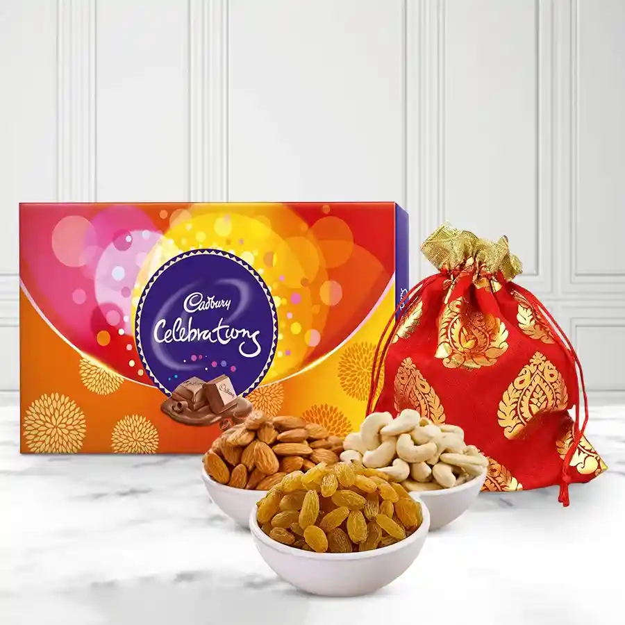 Potli of assorted dry fruits including cashews, raisins, and almonds, paired with a Cadbury Celebrations pack, ideal gift for loved ones.