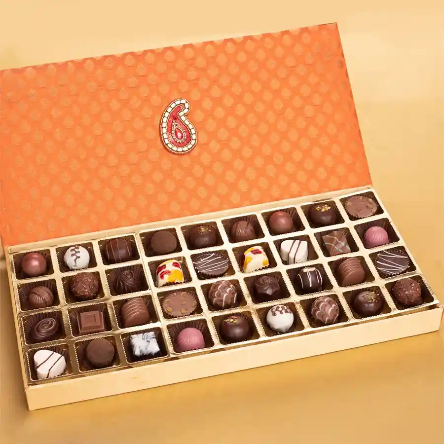 Deluxe Pralines Treats Gift Box with assorted chocolate truffles displayed elegantly