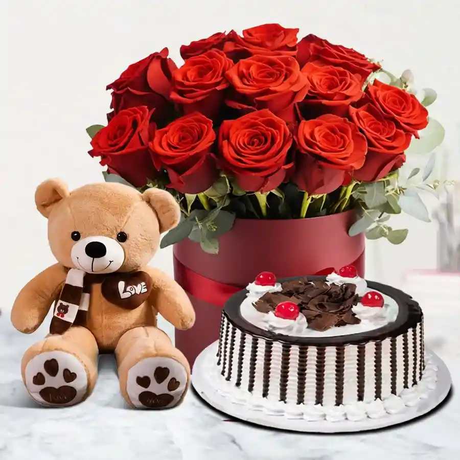 Gift combo featuring 25 red roses, a 1 lb Black Forest cake, and a 6-inch teddy bear.