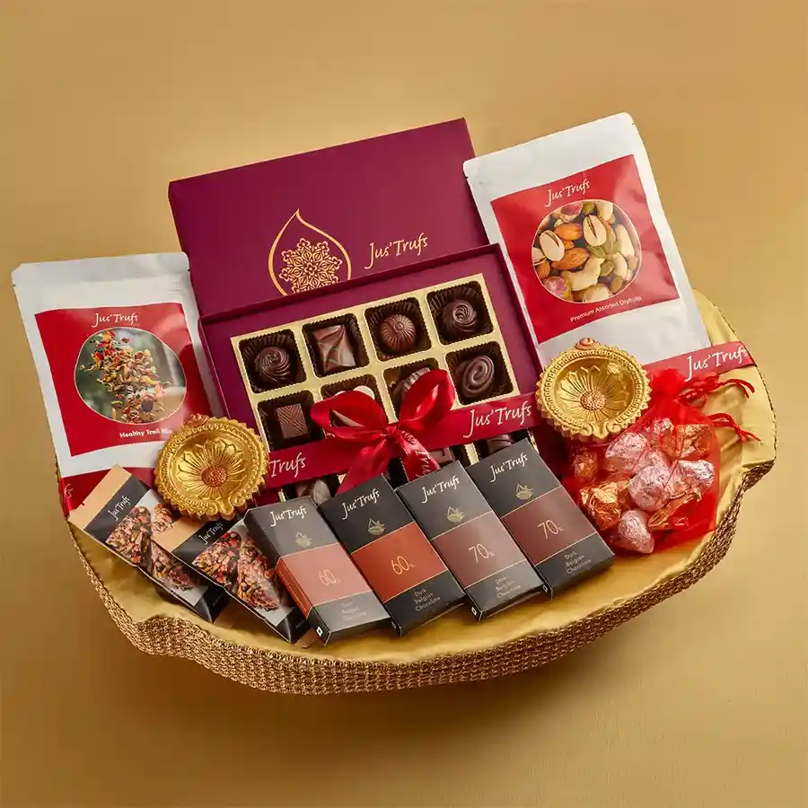 Divine Chocolate Fantasy Hamper featuring a variety of chocolates, healthy snacks, and a decorative diya in a Mandala box.