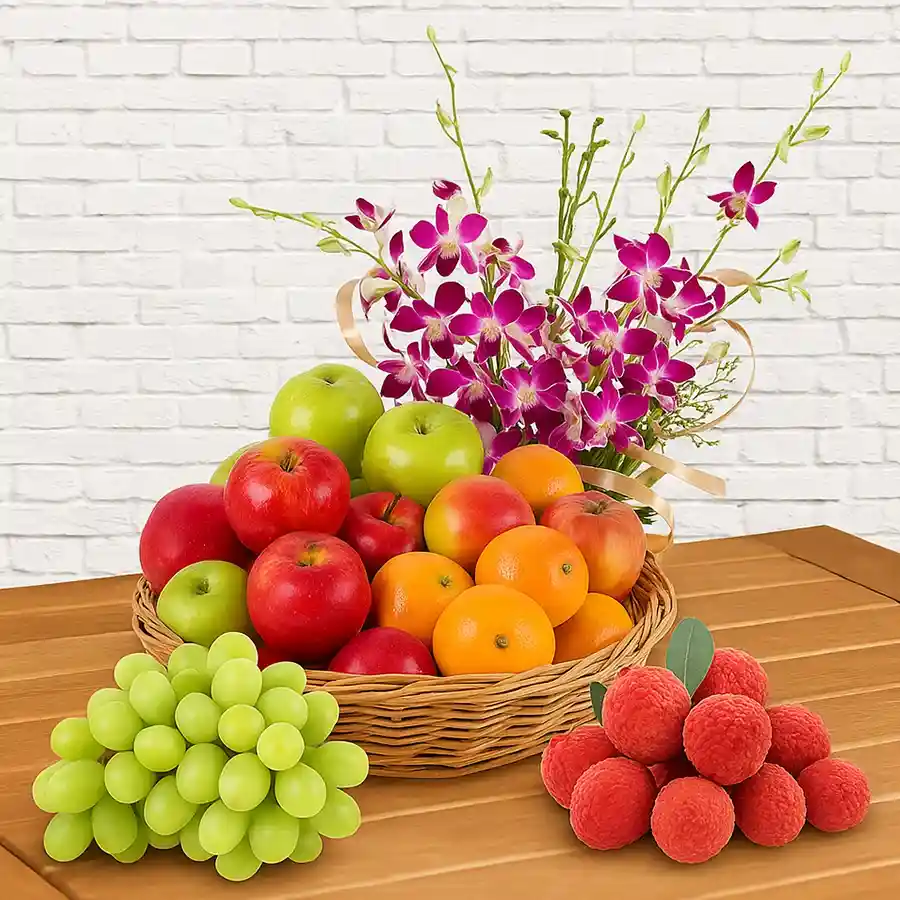 A beautifully arranged Orchid Decorated Fresh Fruits Basket for Mother's Day featuring 2 kgs of assorted seasonal fruits.