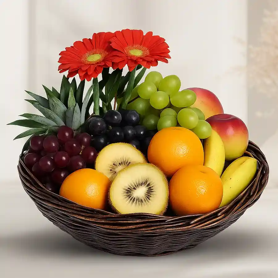 A 3 kg mixed fruit basket adorned with colorful flowers, perfect for celebrations.