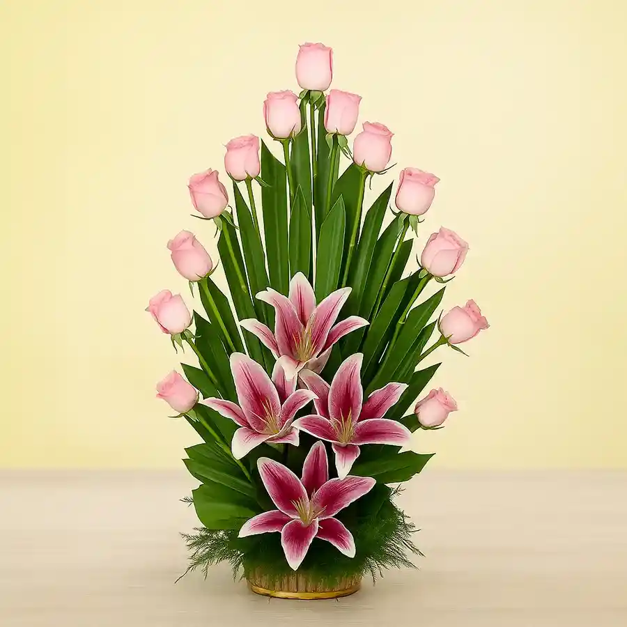 A beautiful basket arrangement with 25 pink roses and 3 pink lilies, showcasing elegance and affection in every bloom.
