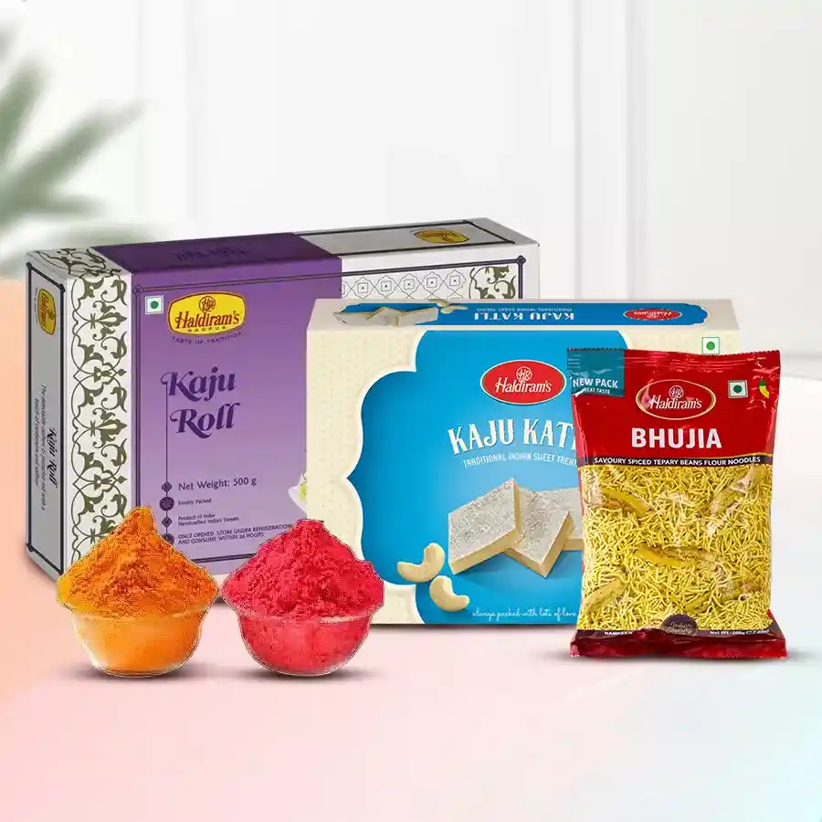 Haldiram Toothsome Elation Cluster festive pack with Kaju Katli, Kaju Roll, Haldiram Bhujiya, and Herbal Gulal for Holi celebrations.