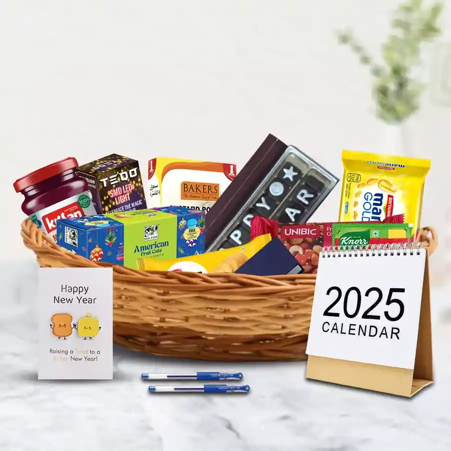 Awesome New Year Traditional Hamper filled with fruit cake, biscuits, apple custard pudding, desk calendar, pocket diary, ballpoint pens, LED lights, cane basket, Kissan jam, tomato soup packets, homemade chocolates, and a New Year card.