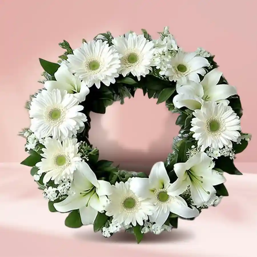 Exclusive Mixed Flowers Sympathy Wreath with white roses, gerberas, and carnations.