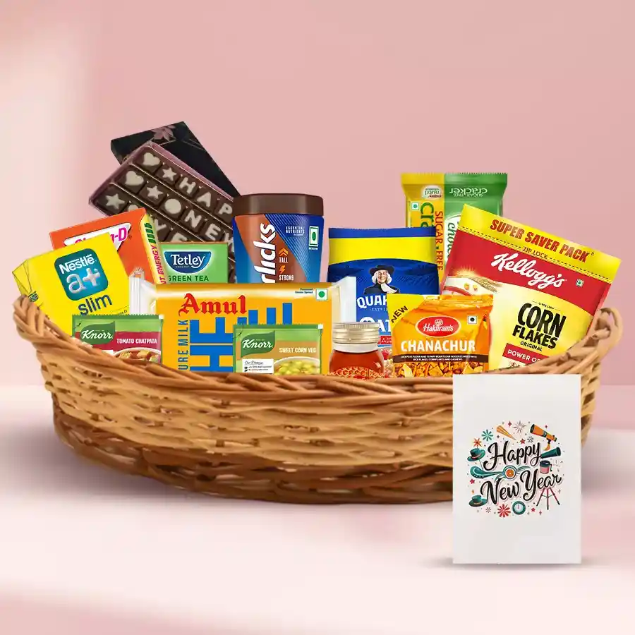 A vibrant assortment of snacks and treats including biscuits, chocolates, cheese slices, and health drinks, presented in a festive container with a Happy New Year card.