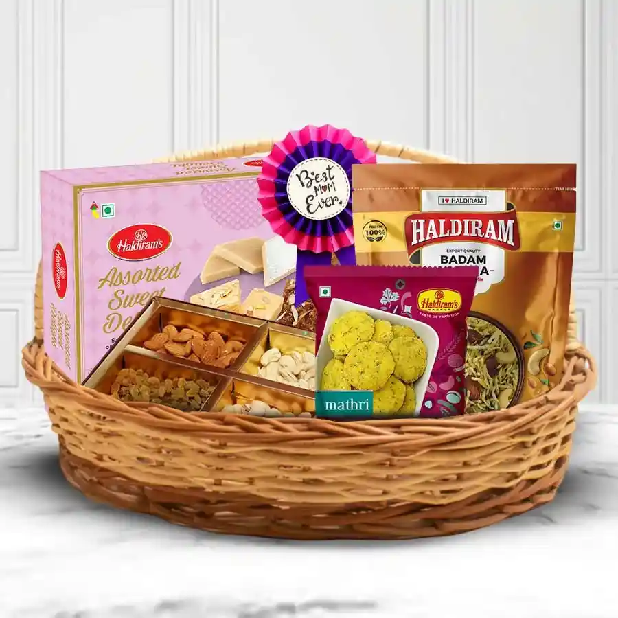 Irresistible Mother's Day Delight Gift Basket filled with assorted dry fruits, Haldiram sweets, Badam Lachha, Methi Mathri, and a Best Mother Award Badge.
