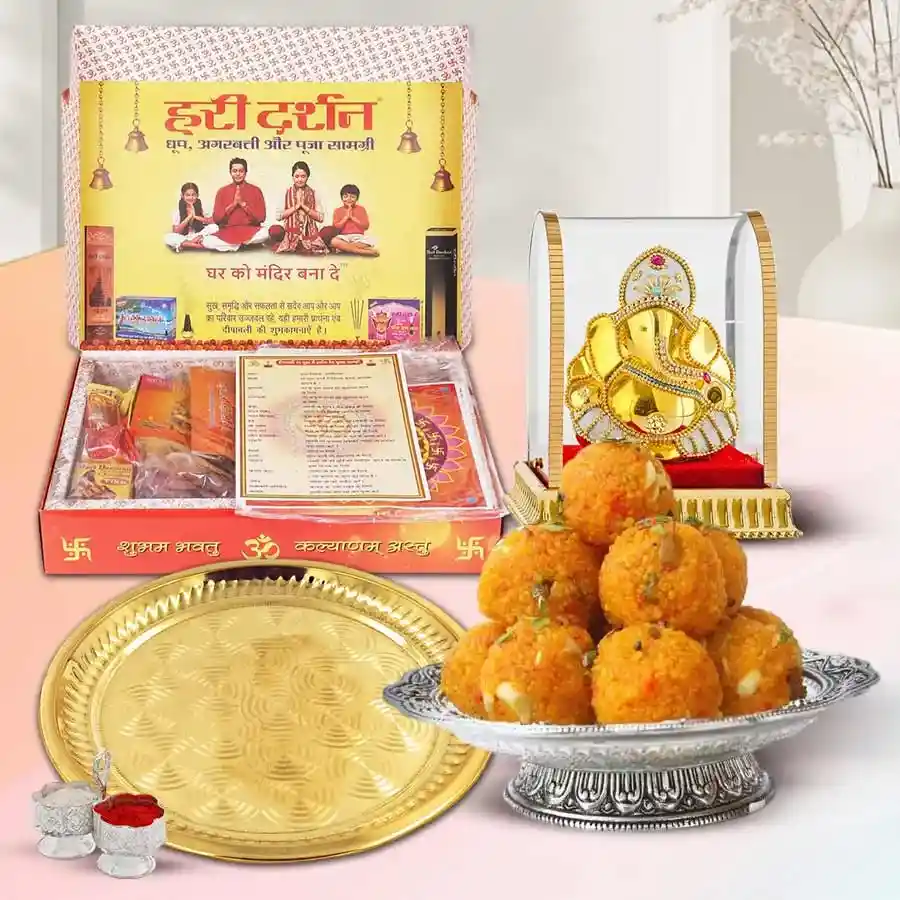 Bhaiya Duj gift pack with Ghee Ladoos, gold-plated thali, Ganesha idol, and puja samagri