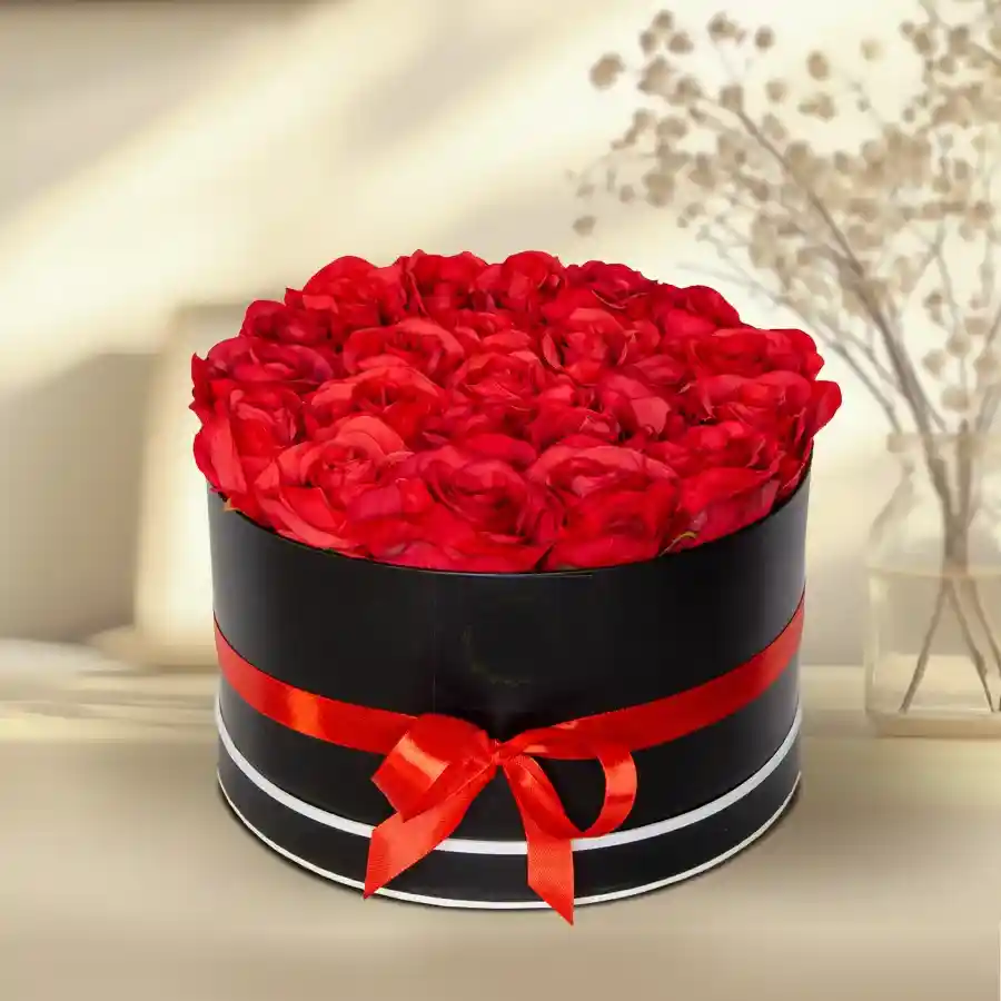 A chic black gift box containing 36 stunning red roses, perfect for expressing love.